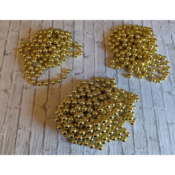 38 ft. Gold Metal Christmas Garland - Picture 1 of 6